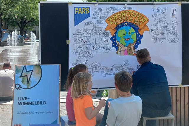 Ein Live-Wimmelbild entsteht mit Illustrator Michael Tewiele. Foto: Stadt Borken